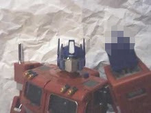 Optimus Prime, from Hasbro's Transformers franchise, doesn't seem to like sharing his name with a tablet computer.