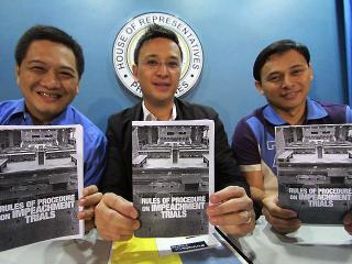 House prosecution spokesmen show the impeachment rules of procedures