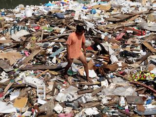 Money in garbage after the floods in Quezon City