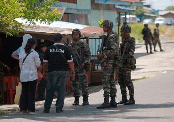 Malaysian troops deployed as Sabah clashes escalate