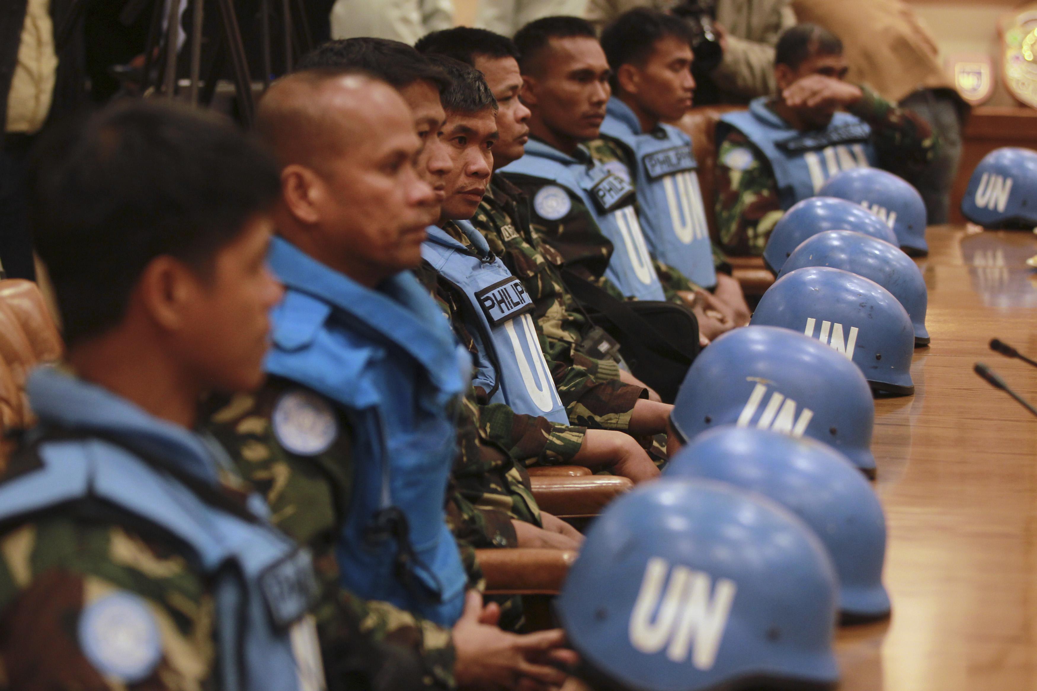 21 Pinoy Peacekeepers Won't Be Immediately Brought Back To PHL After ...